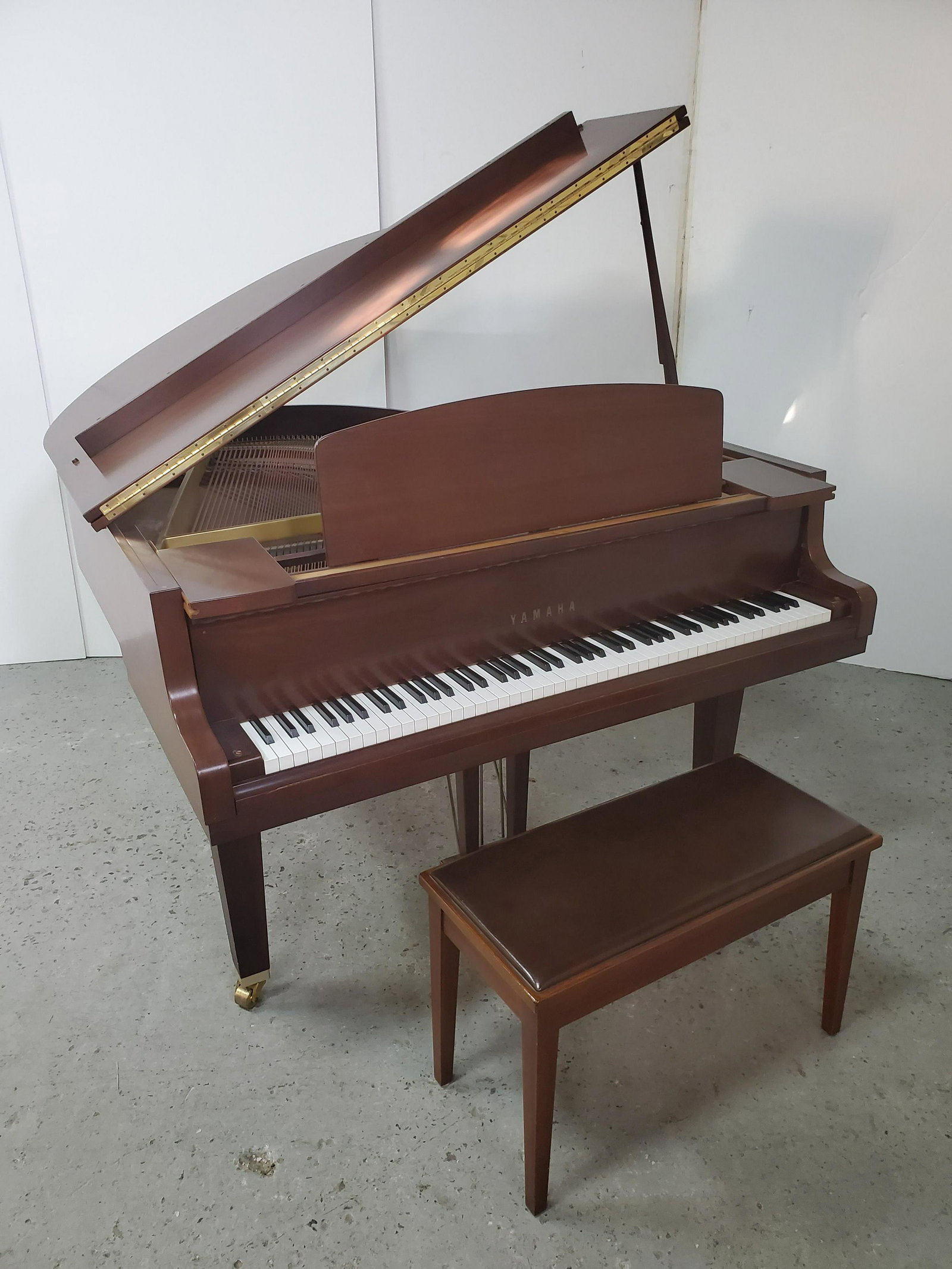 Yamaha GH1 Grand Piano w/ Bench: Cleaned and tuned December 28, 2020. Very good condition. Serial# B5140463. Piano 55 3/4" wide X 63" deep X 39 1/2" high. Bench 30" wide X 14" deep X 19 1/4" high. COPY AND PASTE LINK INTO YOUR BROWSE