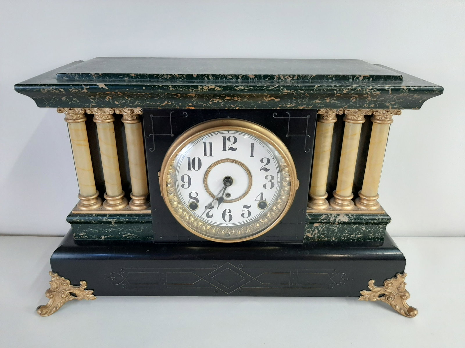 Mantle Clock: Working. 16" wide X 7 1/2" deep X 11" high. Wood with faux-marble finish.