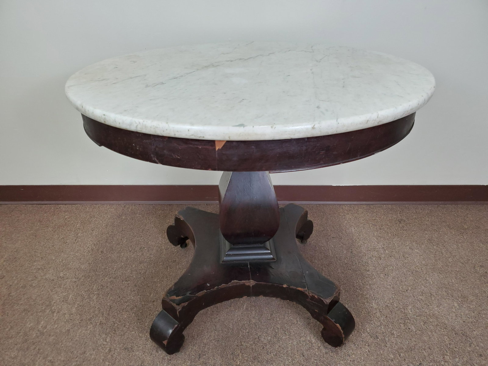 Round Marble Top Table: 34" wide X 34" deep X 30" high. Some chips and loss to veneer. Some trim loss.