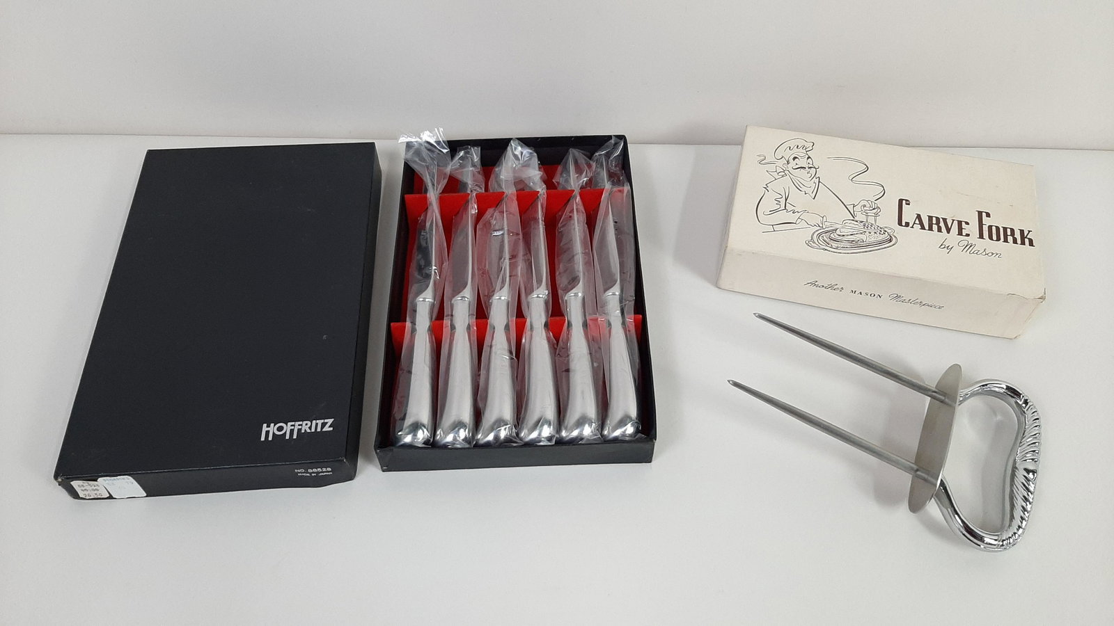 Mason Carve Fork and 6 Hoffritz Steak Knives: Both with original box. Knives: 9" long
