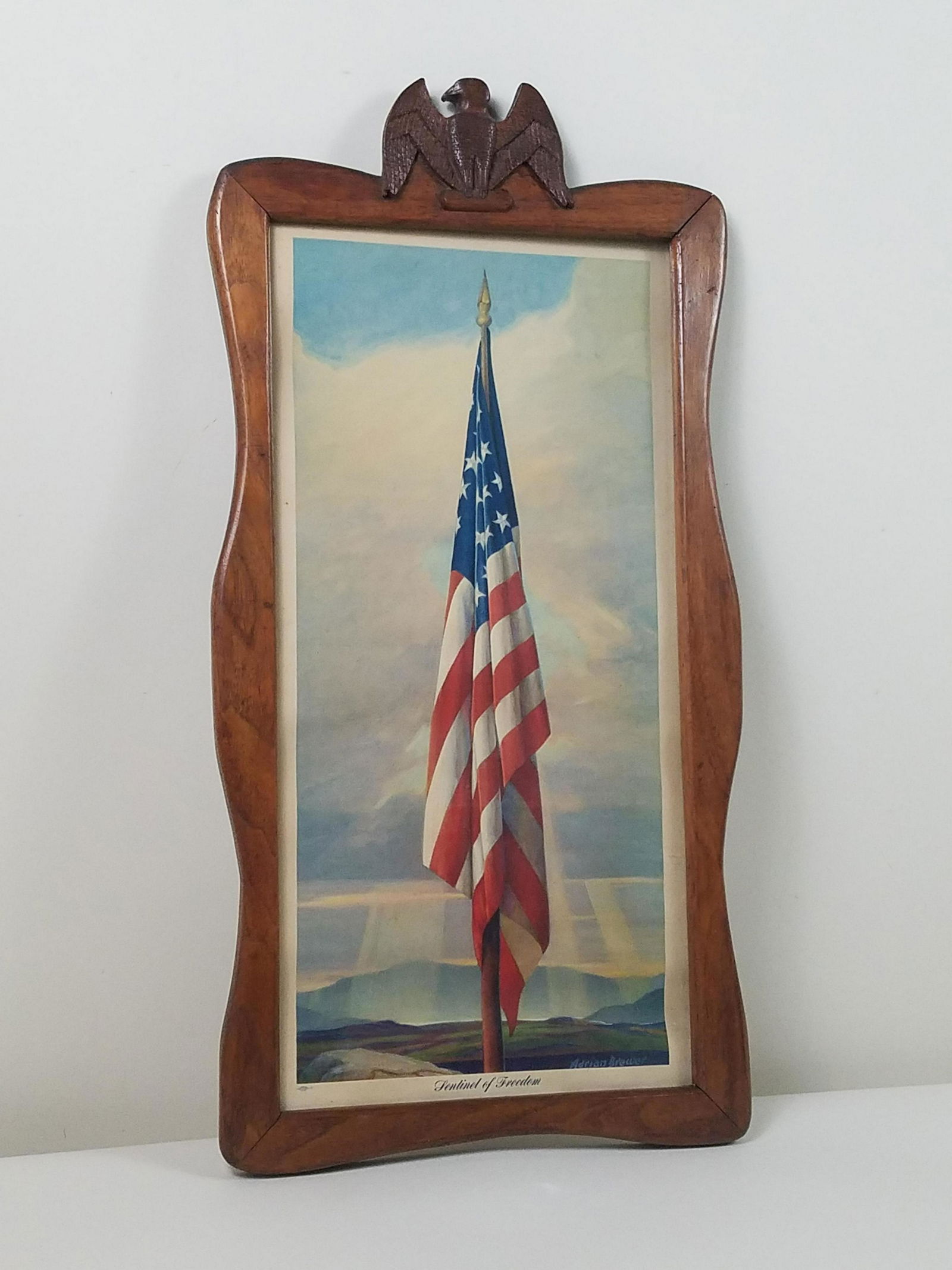 Folk Carved Frame: Includes Sentinel of Freedom print by Adrian Brewer. Frame exterior: 26" high x 13-1/4" wide. Interior: 20-3/4" high x 10-1/4" wide.