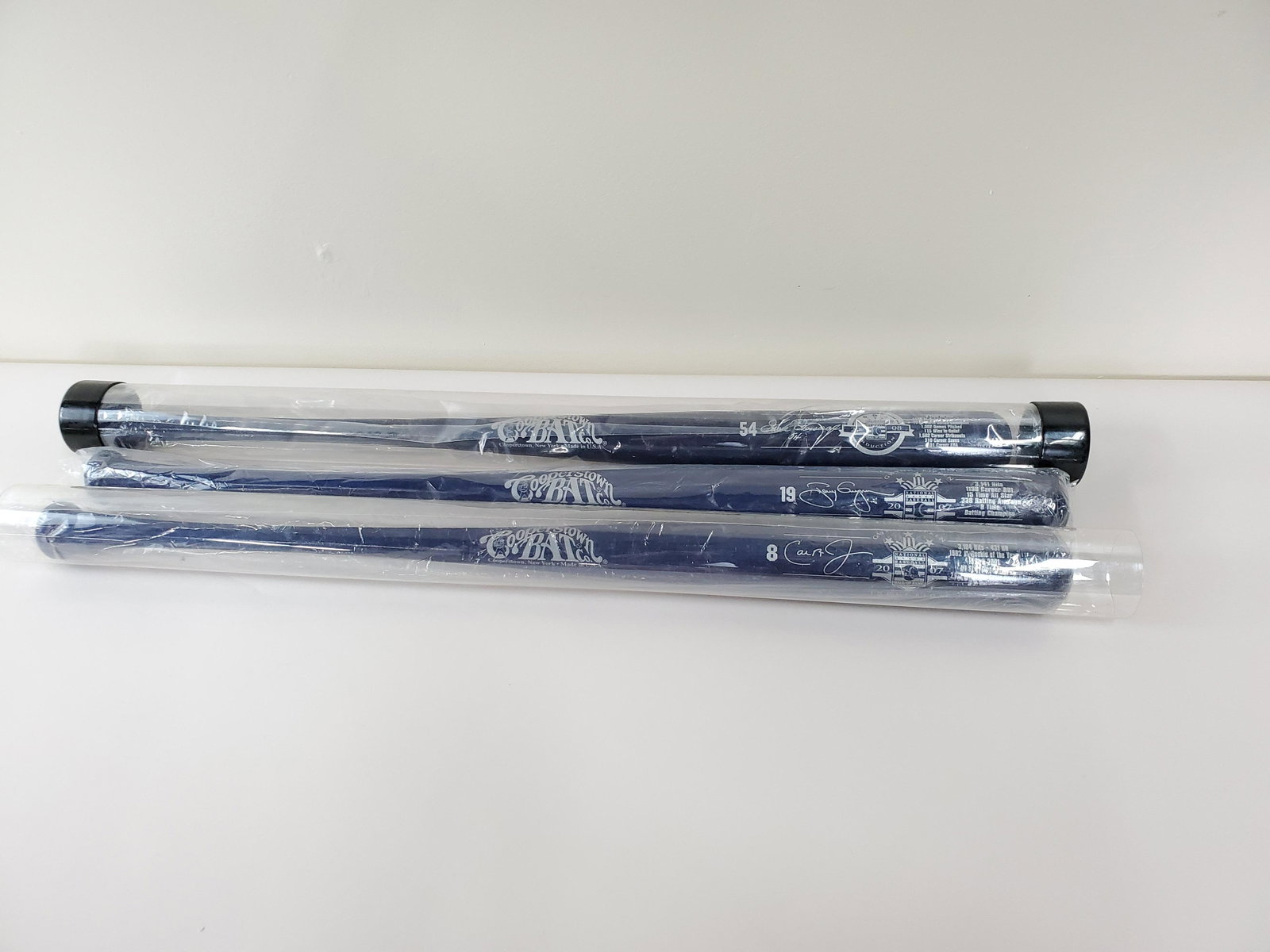 3 Cooperstown Hall Of Fame Baseball Bats: #8, #19, #54. From the Estate Collection of Stephen R. Reed.