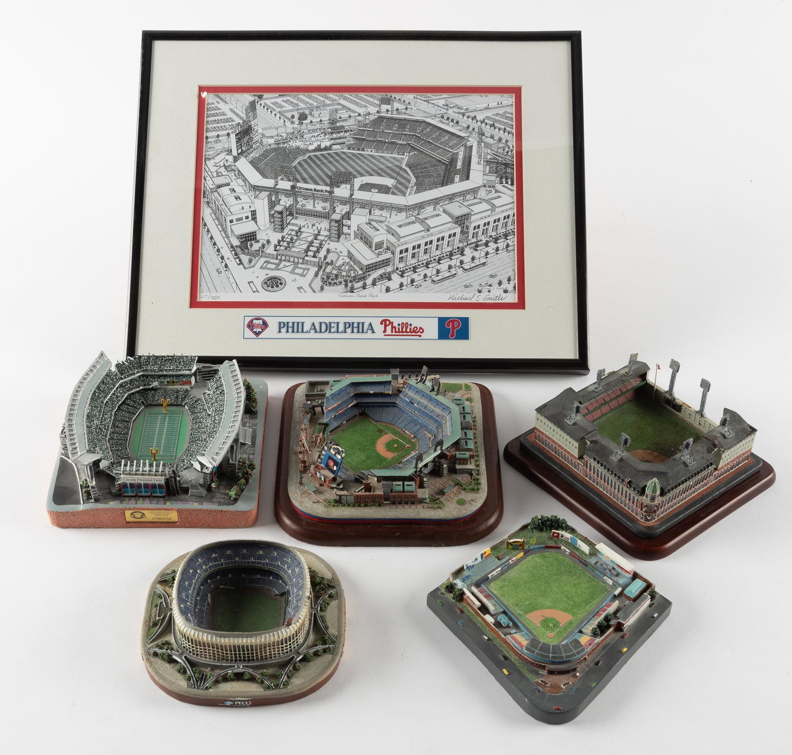 5 Stadium Replicas and Citizens Bank Print: DESCRIPTION: Stadiums include Shibe Park, Lincoln Financial Eagles Field, FirstEnergy Phillies Stadium, Veteran's Stadium, and Citizen's Bank Phillies Stadium. Also includes framed print of Citizen's 