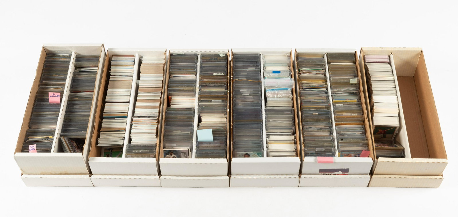 Over 900 Baesball Cards: DESCRIPTION: Includes stars, rookies, and all-stars, such as Barry Bonds, Guerrero, T. Clark, Walker, Martinez, and more. CONDITION: Very good. IMPORTANT: Before bidding, please read the terms and con