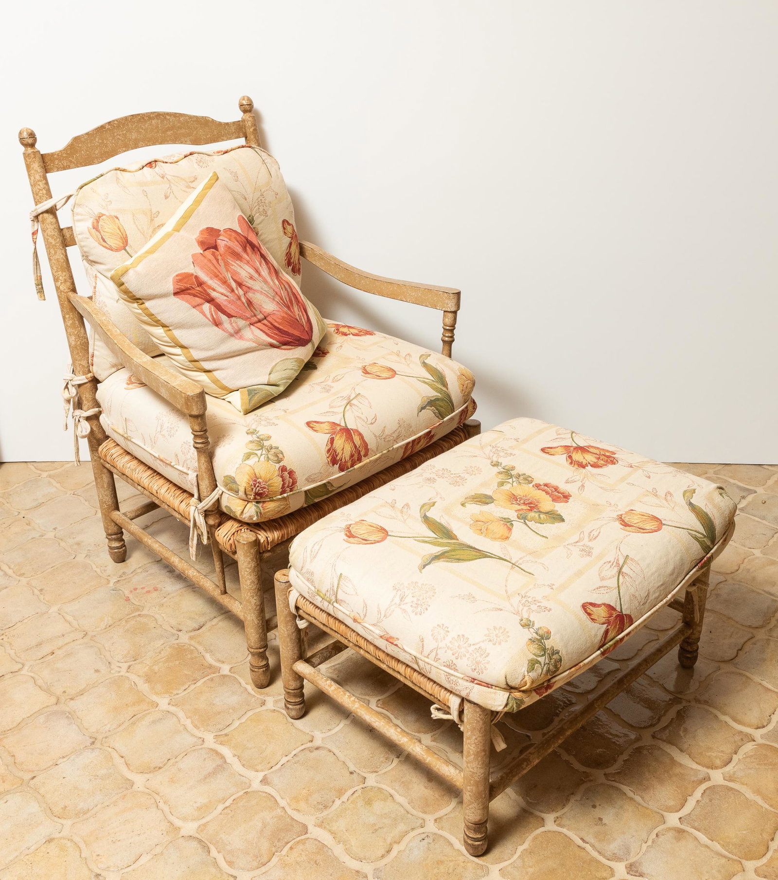 Woodmark Rush Seat Armchair and Ottoman: With floral cushions. Chair 29 1/2" wide x 28" deep x 39 1/2" high. Ottoman 27 3/4" wide x 19 3/4" deep x 13 1/4" high. IMPORTANT: Before bidding, please read the terms and conditions. When you regist
