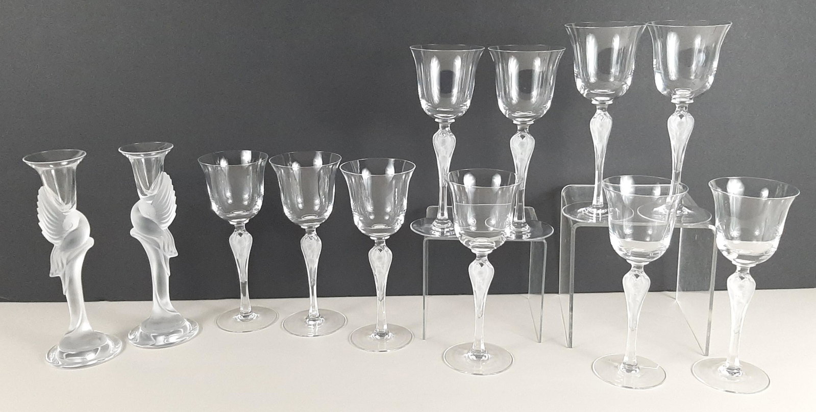 12 Faberge Wine Glasses incl. Pavlova: 10 Pavlova wine glasses. Also includes 2 Faberge Swan candlesticks. 8" to 9" high. One with small chip to rim. IMPORTANT: Before bidding, please read the terms and conditions. When you registered for 
