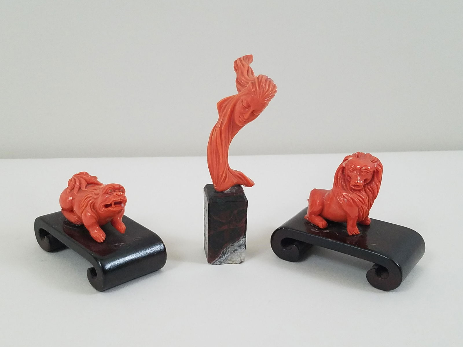 3 Small Coral Carved Figures (1 of 2)