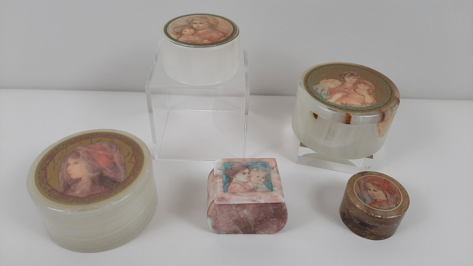5 Edna Hibel Trinket Boxes: Includes marble and hardstone. 2" to 4" diameter X 1¼" to 2¼" high. One with no base. One with loss to lid. IMPORTANT: Before bidding, please read the terms and conditions. When you registered for t