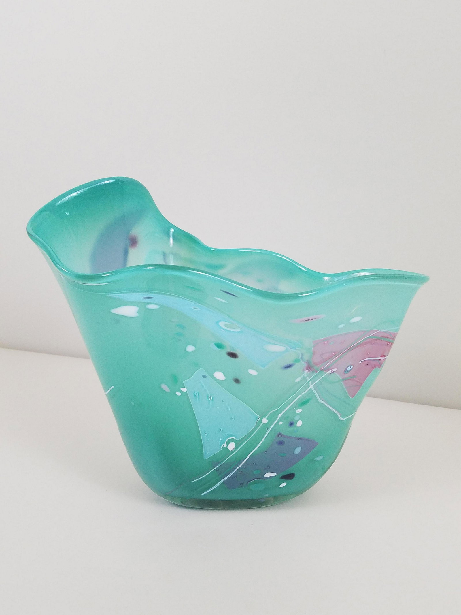 Art Glass Handkerchief Vase: 13" wide x 7-1/2" deep x 11-1/2" high. Unsigned. IMPORTANT: Before bidding, please read the terms and conditions. When you registered for the auction you agreed to these terms and will be required to 