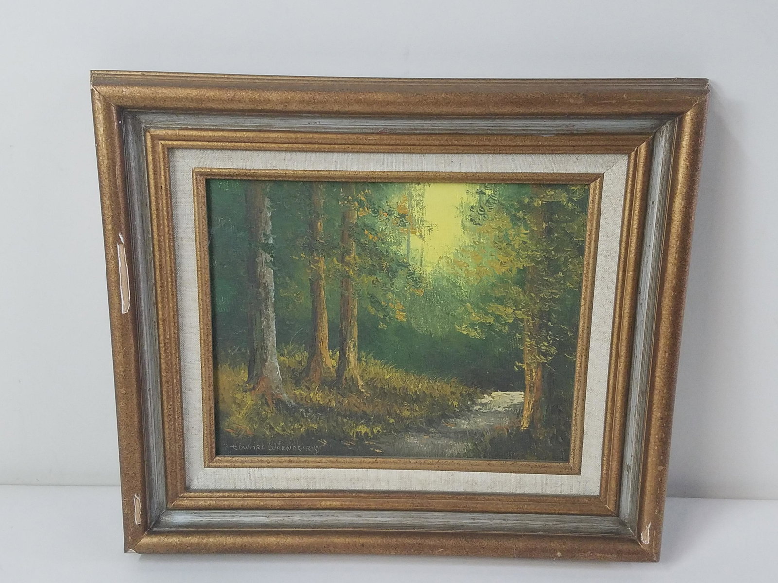 Edward Warnagiris Forrest Painting: Overall with frame 13" high x 14-1/2" wide. Some frame losses. IMPORTANT: Before bidding, please read the terms and conditions below. When you registered for the auction you agreed to these terms and 