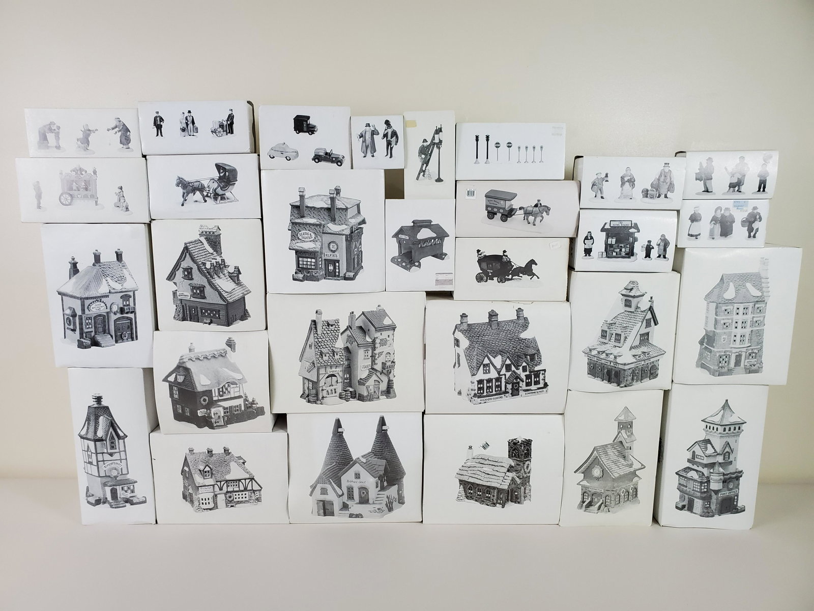 29 Pcs Department 56 Village Buildings: Includes City News Stand, Rimpys Bakery, Organ Grinder, ETC. IMPORTANT: Before bidding, please read the terms and conditions below. When you registered for the auction you agreed to these terms and wi