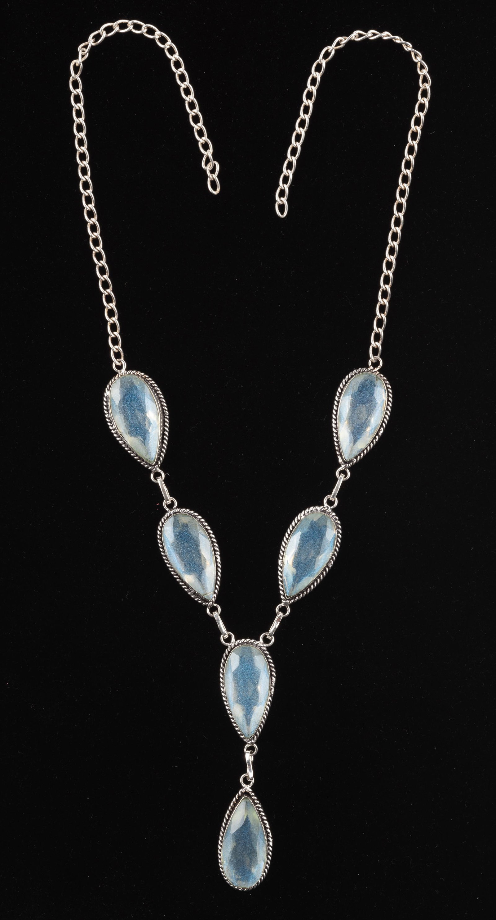 Sterling and Moonstone Necklace: 21" with additional 3" drop, missing clasp. IMPORTANT: Before bidding, please read the terms and conditions. When you registered for the auction you agreed to these terms and will be required to compl
