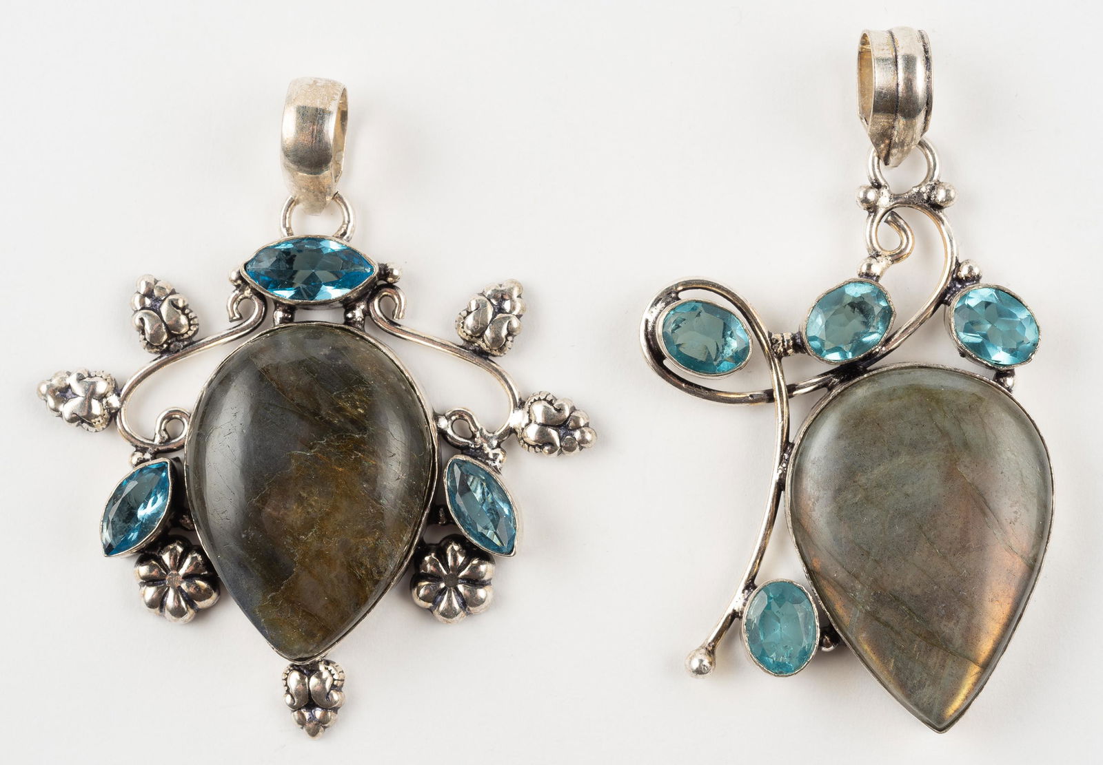 2 Labradorite & Blue Topaz Pendants: 2 1/2" long and 2 1/3" long. IMPORTANT: Before bidding, please read the terms and conditions. When you registered for the auction you agreed to these terms and will be required to comply with them.