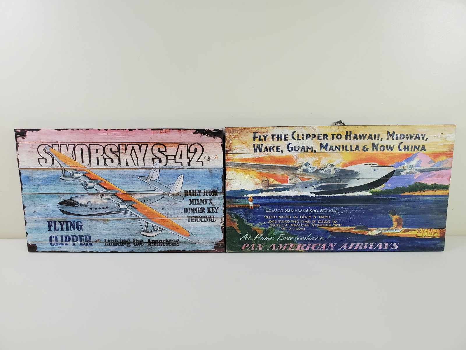 2 Clipper Red Horse Signs: Sikorsky S-42 24" wide X 14 3/4" high. Pan American Airways 26" wide X 15" high. IMPORTANT: Before bidding, please read the terms and conditions. When you registered for the auction you agreed to thes