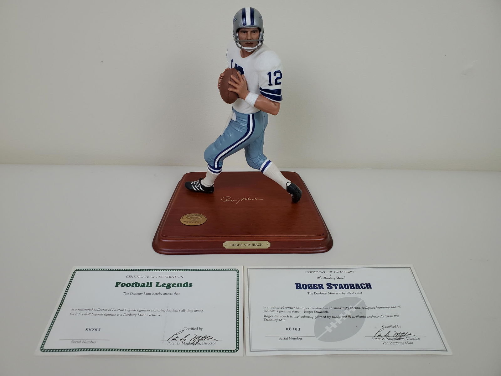 Roger Staubach All Star Figure: Danbury Mint. 7 1/2" wide X 5 1/4" deep X 8 3/4" high. IMPORTANT: Before bidding, please read the terms and conditions. When you registered for the auction you agreed to these terms and will be requir