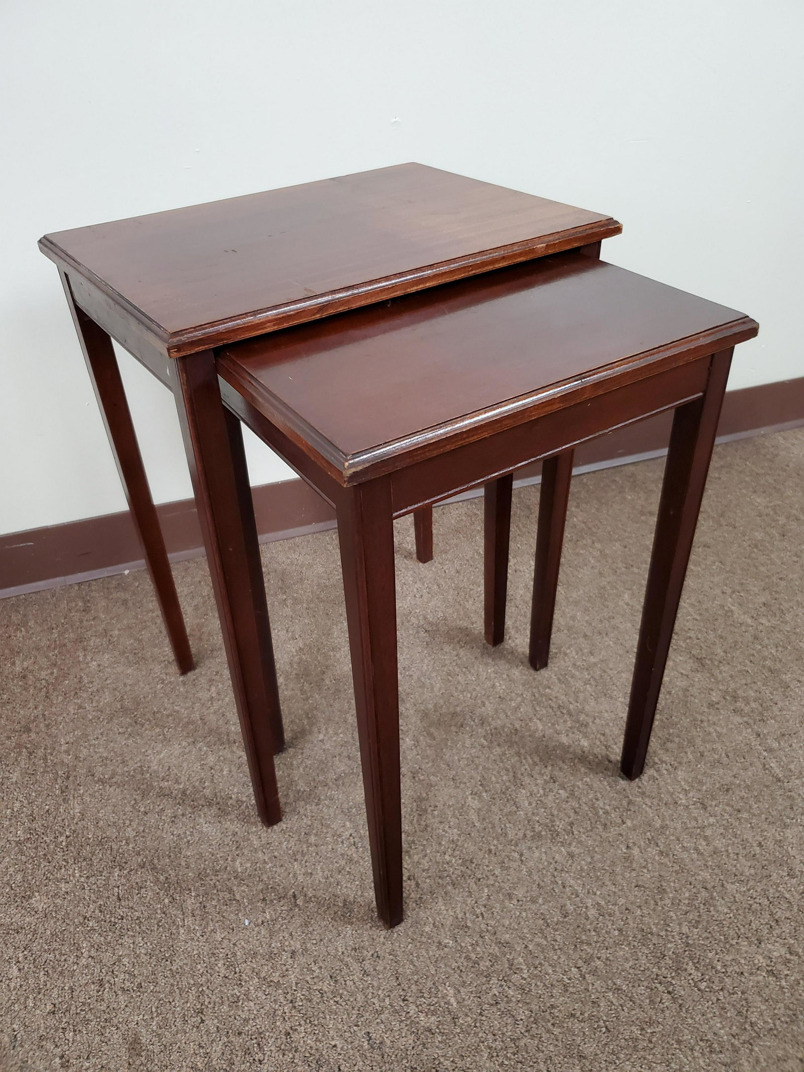 Nesting Tables: 17" wide X 12 3/4" deep X 22" high. IMPORTANT: Before bidding, please read the terms and conditions. When you registered for the auction you agreed to these terms and will be required to comply with t