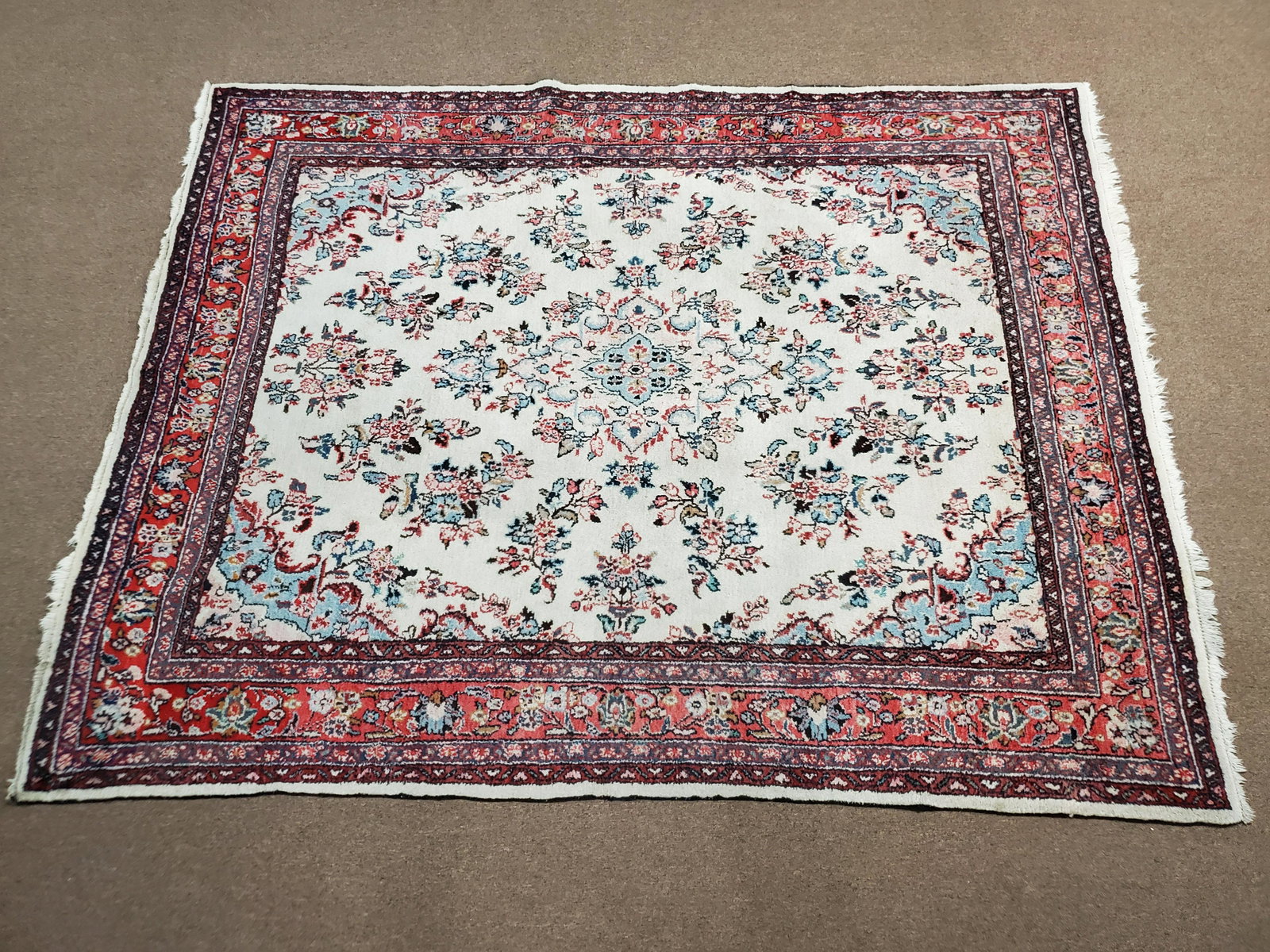 Persian Kapoutrang (Hamedan) Rug: C. 1950s Avakian Bros Woop Pile Area Rug. Unique ivory Field with a central medallion including blue and red highlights. 9'9" X 7'11". IMPORTANT: Before bidding, please read the terms and conditions. 