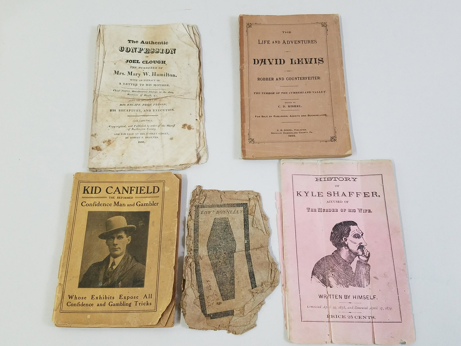 5 Publications on Executions, Murder & Robberies: Includes the Life and Adventures of David Lewis, kid Canfield The reformed Confidence Man in Gambling, The Authentic Confession of Joel Clough, and The History of Kyle Shaffer Accused of The Murder of