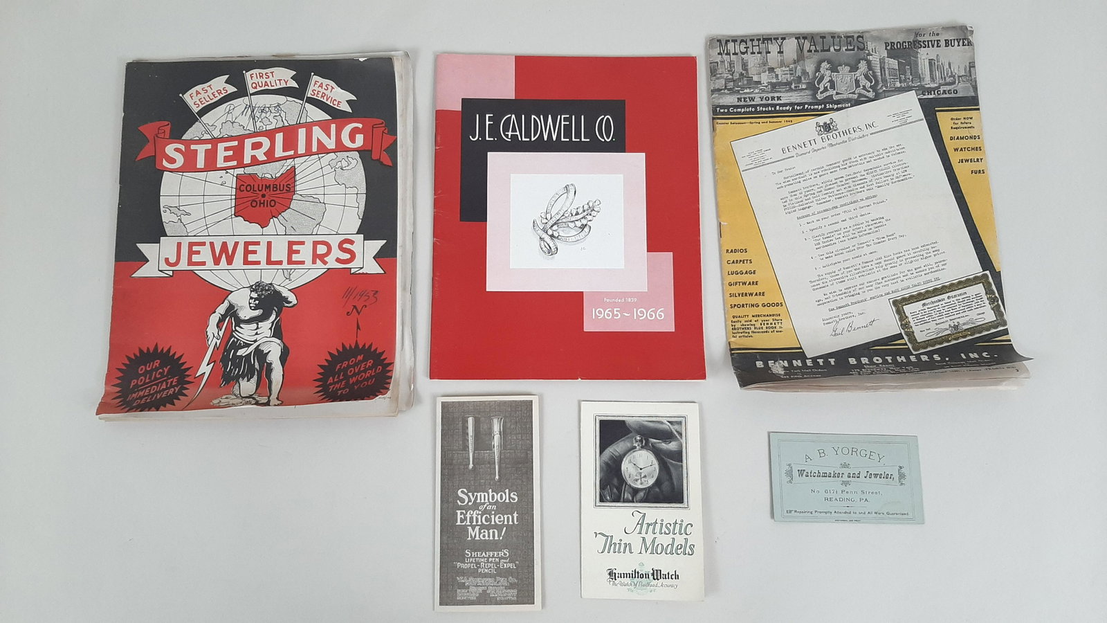 6 Vintage Catalogues incl. Jewelry and Watches: Includes Sterling Jewelers, J.E. Caldwell Co., Bennet Brothers, Inc., Hamilton Watch, A.B. Yorgey, and W.A. Sheaffer Pen Co. IMPORTANT: Before bidding, please read the terms and conditions. When you r