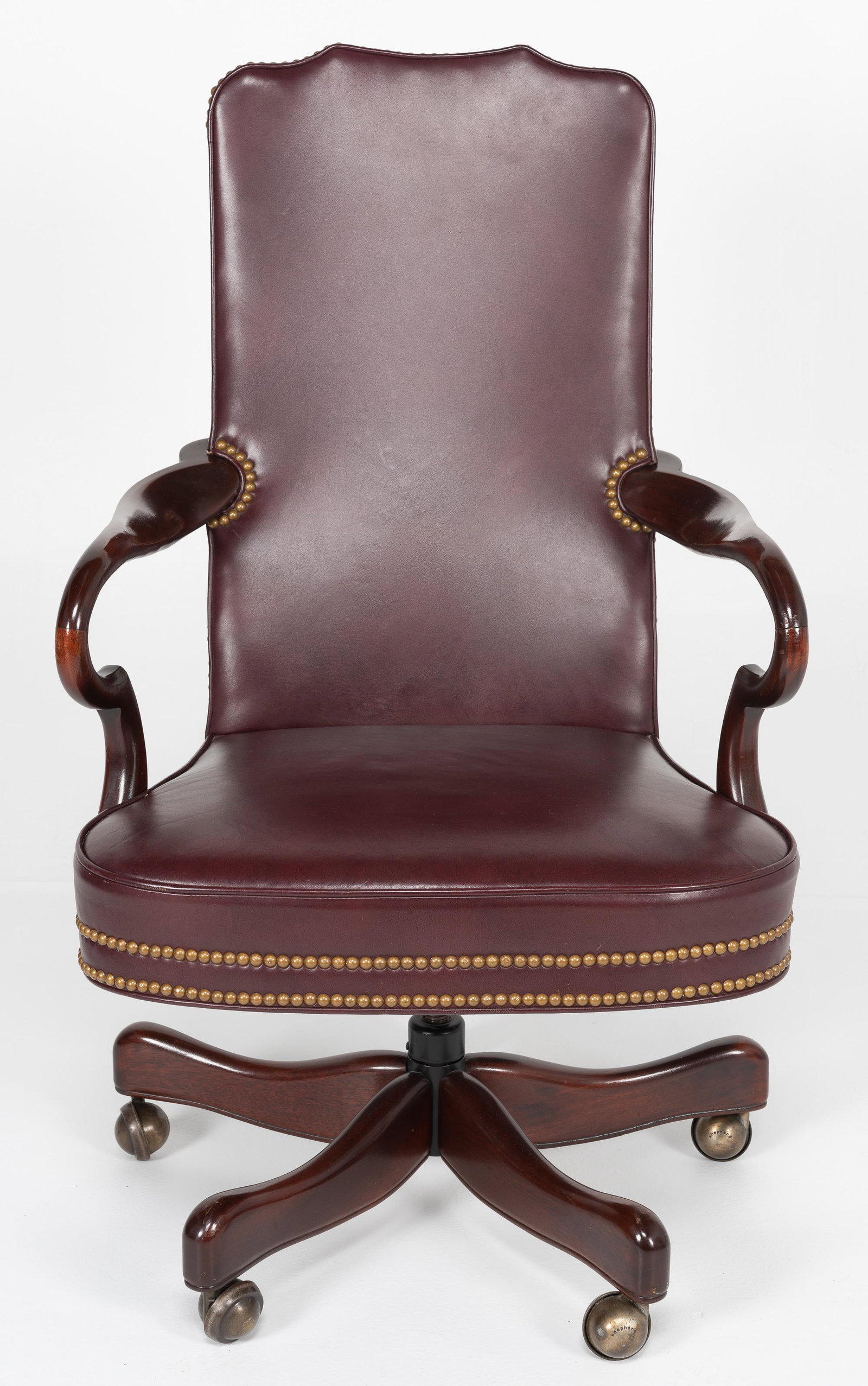Hickory Chair Co Gooseneck Arm Chair: CONDITION: Hickory Chair Company gooseneck arm chair on swivel. Mahogany frame with brown leather and nail head trim. MEASUREMENTS: 26" long x 28" deep x 44" high. CONDITION: Very good. Minor surface 