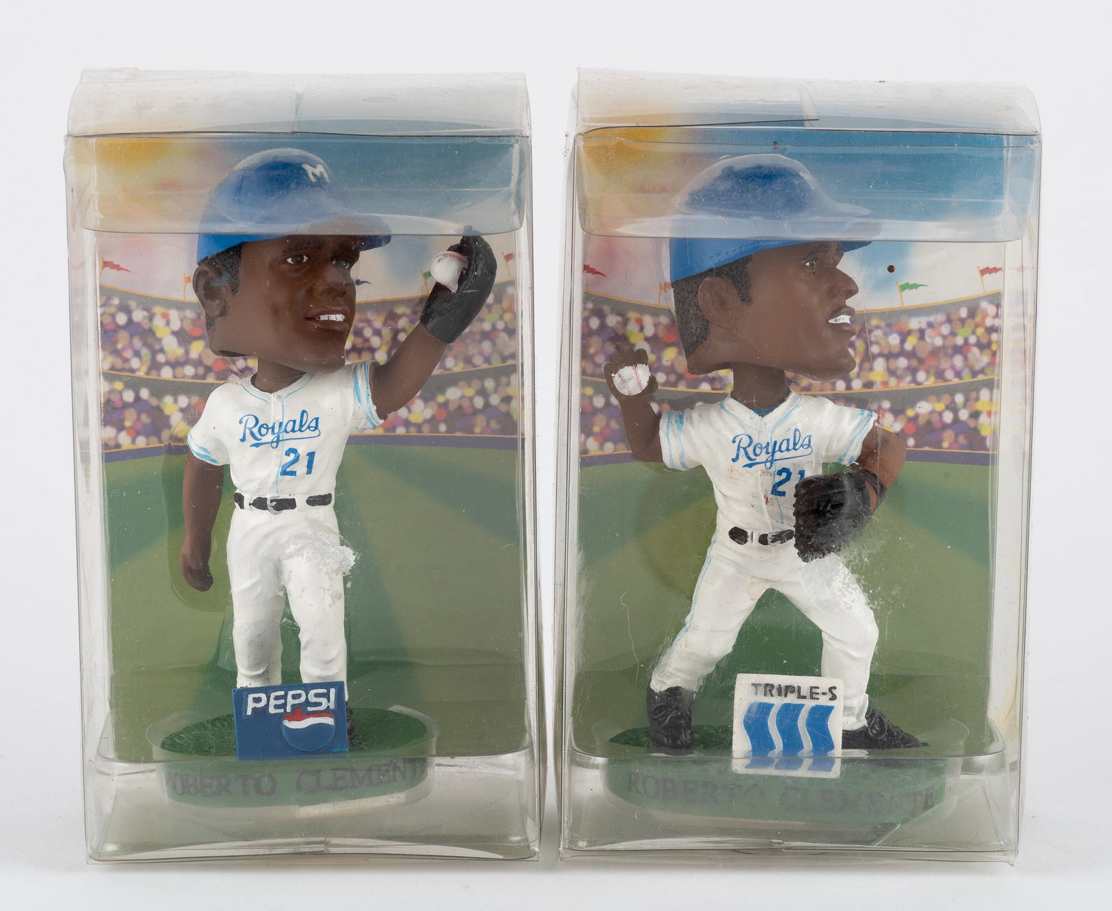 2 Roberto Clemente Mini Bobbleheads: DESCRIPTION: Includes Triple-S and Pepsi. IMPORTANT: Before bidding, please read the terms and conditions. When you registered for the auction you agreed to these terms and will be required to comply 