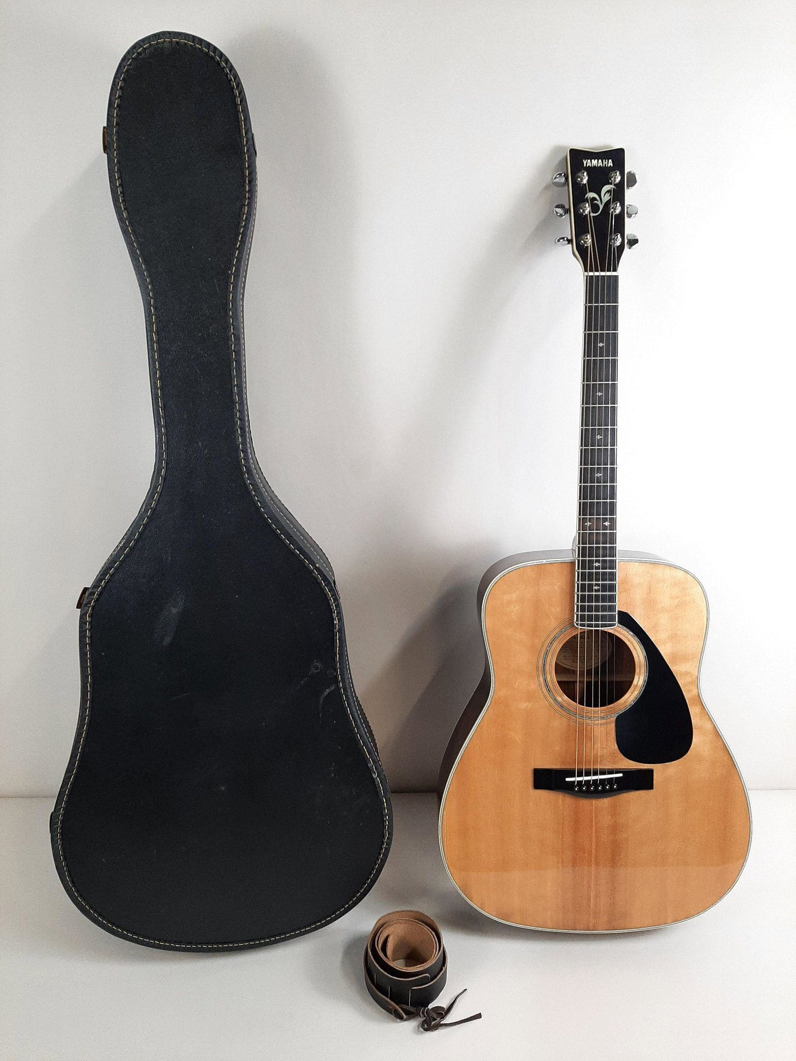 Yamaha FG-450SA Acoustic Guitar: Includes case and strap. Serial no. 10305273. IMPORTANT: Before bidding, please read the terms and conditions. When you registered for the auction you agreed to these terms and will be required to com
