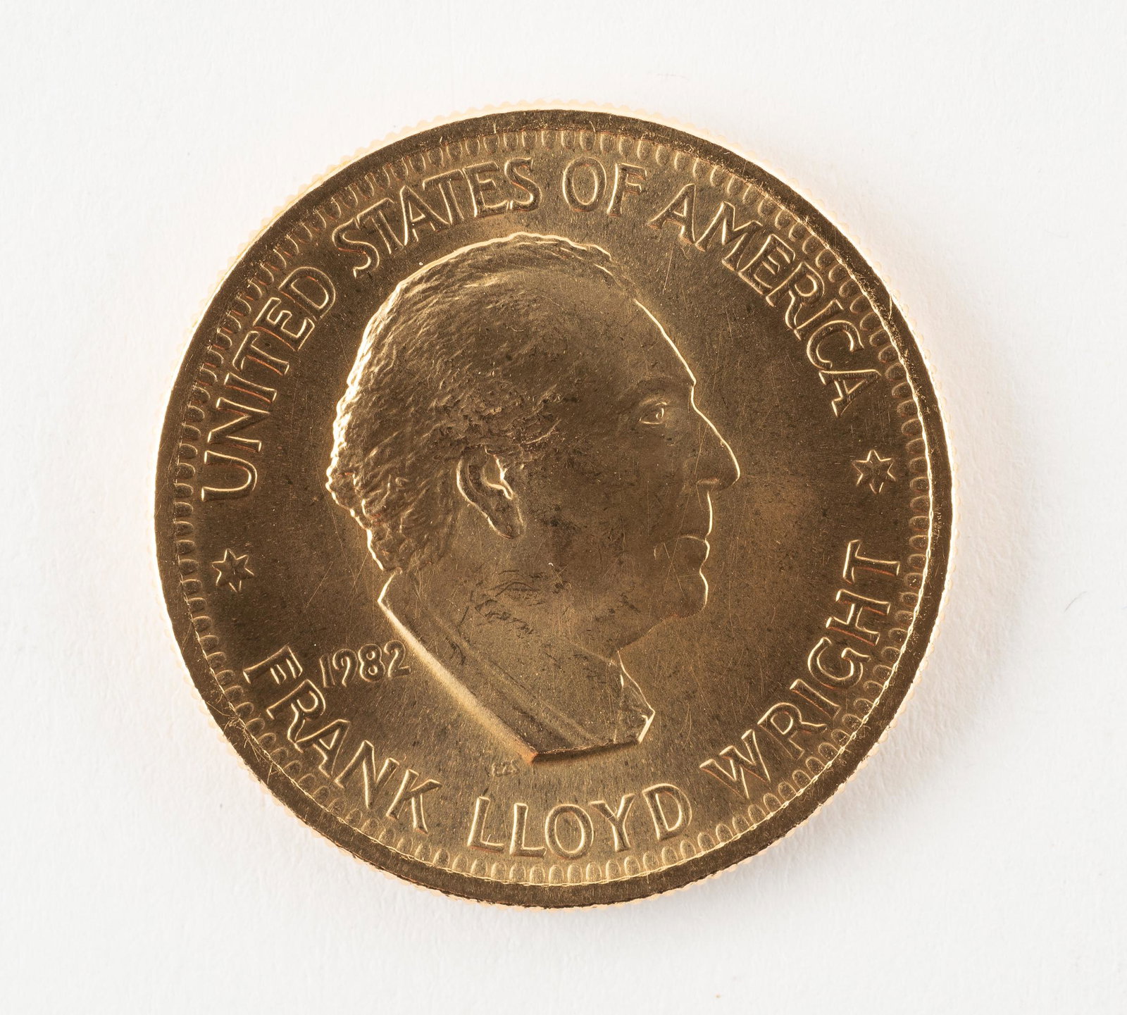 1982 Frank Lloyd Wright 1/2oz Gold Coin: Uncirculated. IMPORTANT: Before bidding, please read the terms and conditions. When you registered for the auction you agreed to these terms and will be required to comply with them.