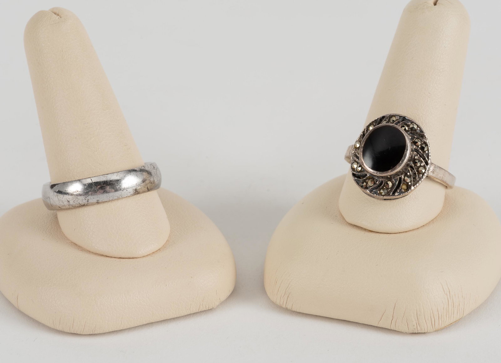 2 Sterling Rings: Band 5mm wide, size 9-1/2. Marcasite & Onyx ring top 3/4" high, size 8-1/4. IMPORTANT: Before bidding, please read the terms and conditions. When you registered for the auction you agreed to these ter