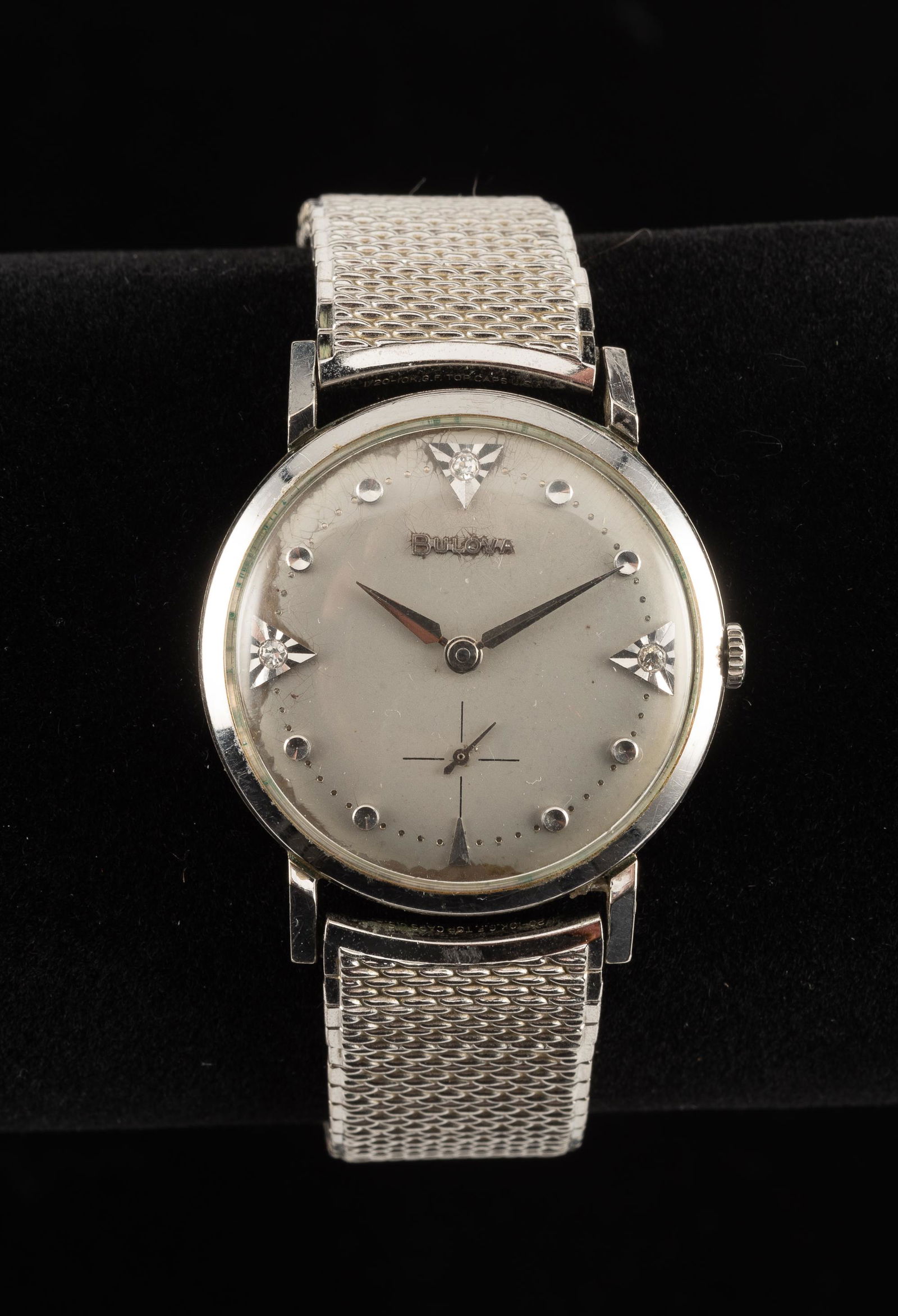 Vintage Bulova 23J Men's Wristwatch: Movement marked 10BZ. Subsidiary second hand. With diamond accents at 12, 3, and 9. In GF case with later Speidel stainless bracelet. Running. IMPORTANT: Before bidding, please read the terms and cond