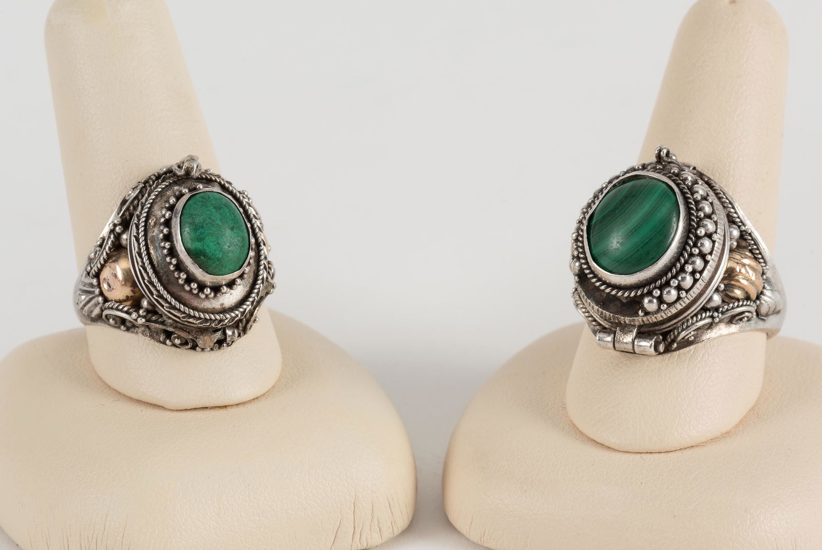 2 Sterling Poison Rings: 1) Stamped 925, set with malachite. Missing part of top rim. Size 9. 2) Stamped 925, set with green harstone. Hinge broken, glued shut. Size 9. IMPORTANT: Before bidding, please read the terms and con