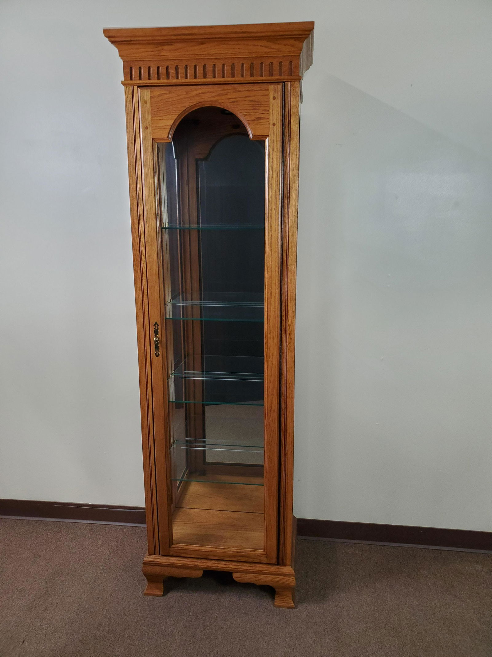 Jasper Cabinets Lighted Curio: 23 1/4" wide X 14 1/4" deep X 79" high. IMPORTANT: Before bidding, please read the terms and conditions. When you registered for the auction you agreed to these terms and will be required to comply wi