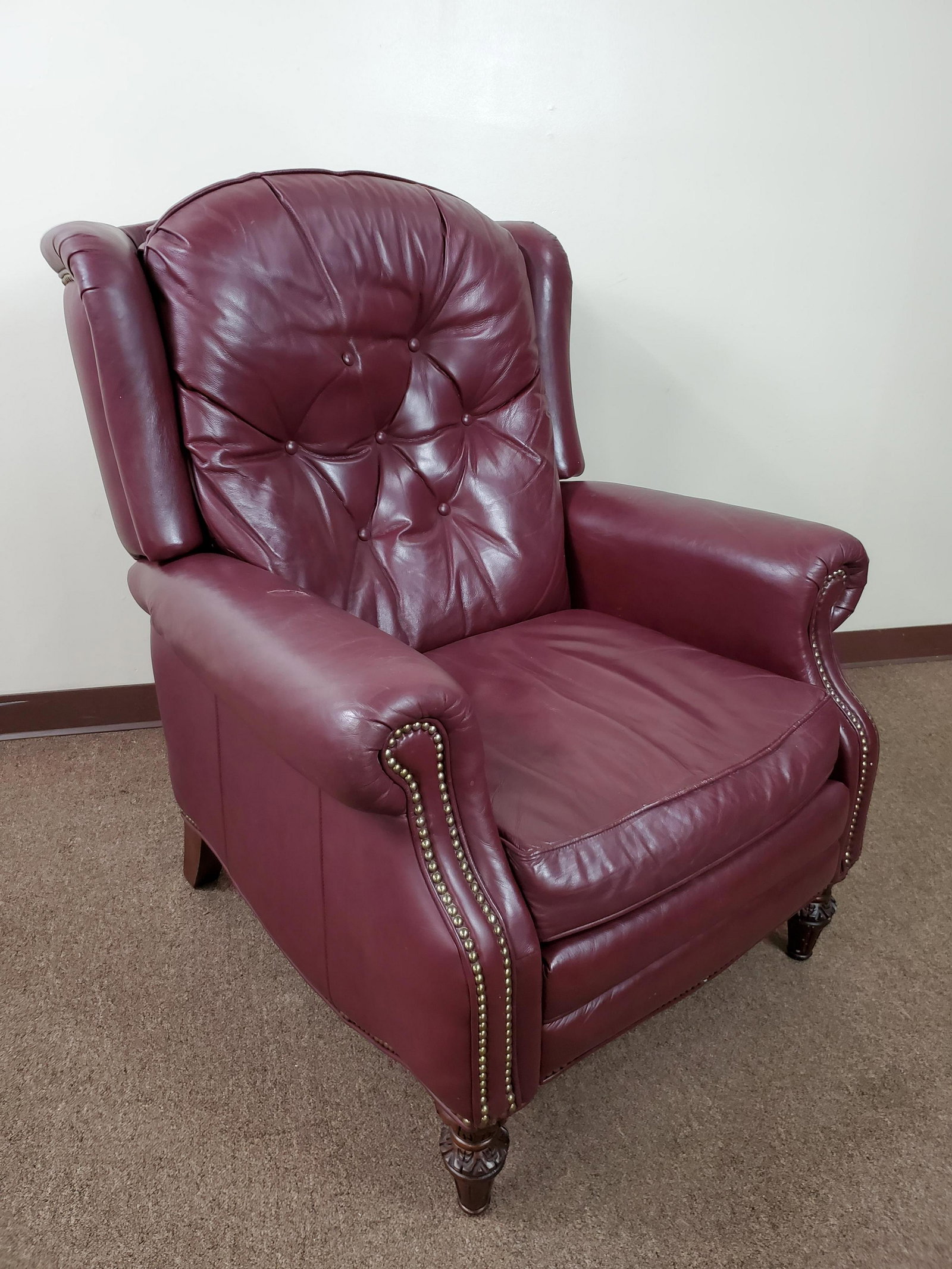 Leather Recliner: 35" wide X 34" deep X 42" high. Has repair on one arm rest. IMPORTANT: Before bidding, please read the terms and conditions. When you registered for the auction you agreed to these terms and will be r