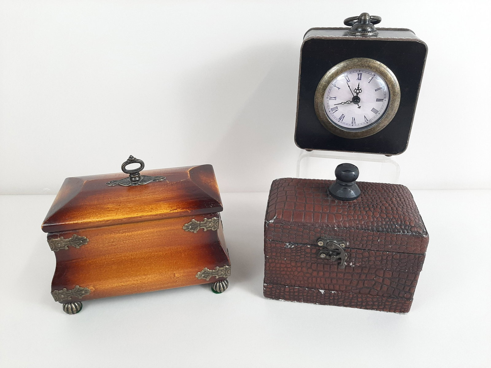 3 Decorative Boxes incl. Clock: 5¼ to 7¾" wide X 3" to 4¾" deep X 6" to 6½" high. Clock battery powered. IMPORTANT: Before bidding, please read the terms and conditions. When you registered for the auction you agreed to these te
