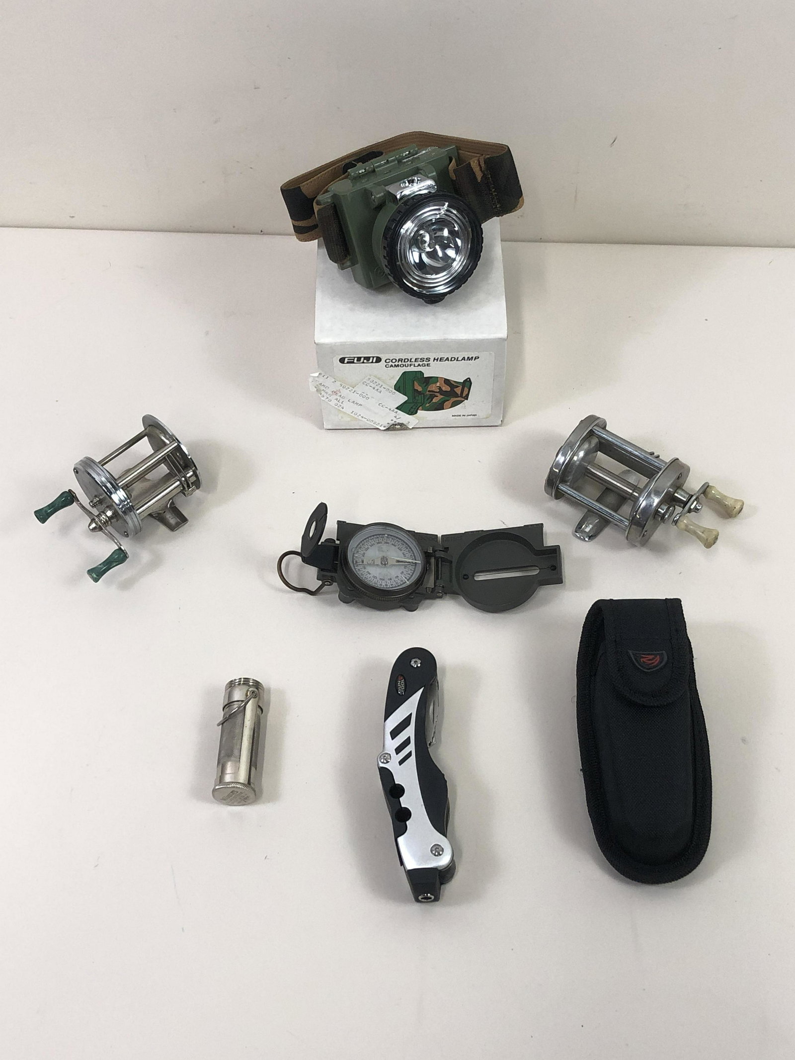 6 Pcs Reels, Compass & Tools: Also includes FUJI headlamp. IMPORTANT: Before bidding, please read the terms and conditions. When you registered for the auction you agreed to these terms and will be required to comply with them.