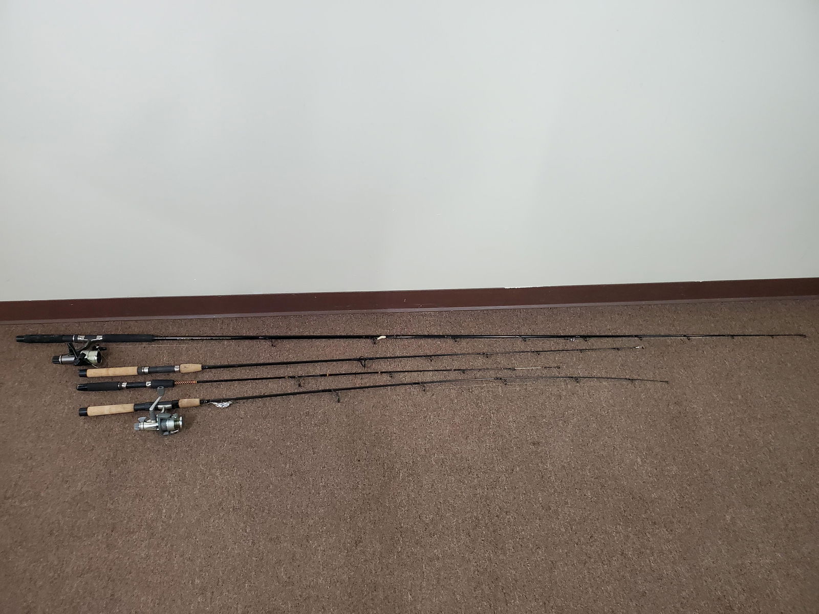 4 Fishing Rods With 2 Reels (1 of 3)