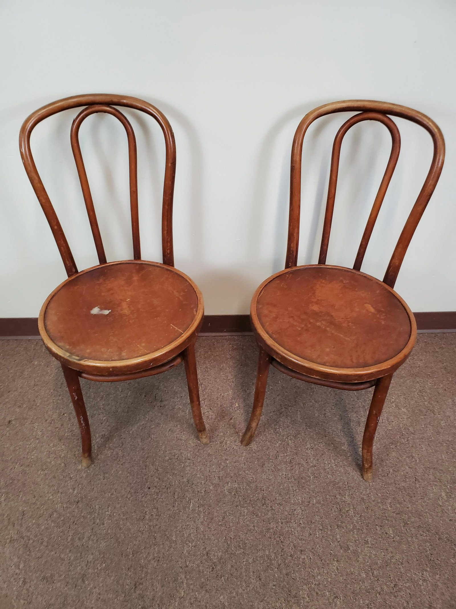 Pair Of Thonet Bentwood Chairs: 16 1/4" wide X 16 1/2" deep X 35 1/4" high. IMPORTANT: Before bidding, please read the terms and conditions. When you registered for the auction you agreed to these terms and will be required to compl