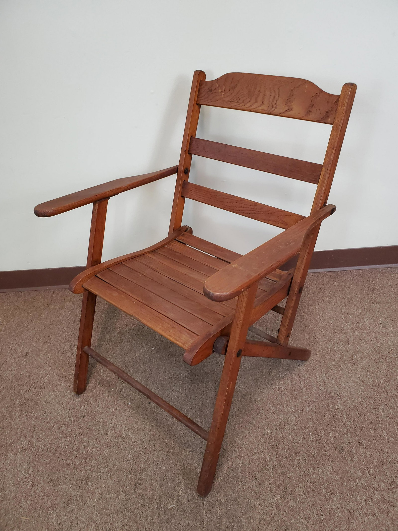 Folding Arm Chair: 24" wide X 20" deep X 32" high. IMPORTANT: Before bidding, please read the terms and conditions. When you registered for the auction you agreed to these terms and will be required to comply with them.