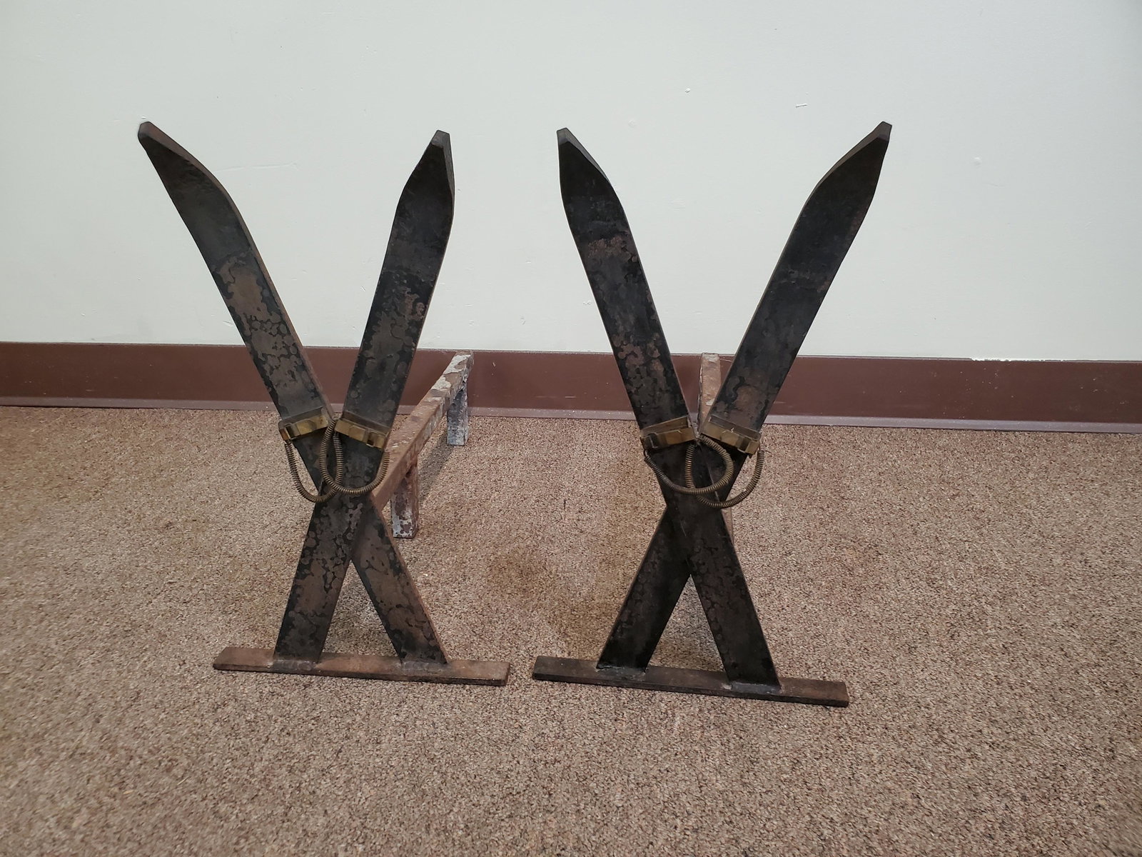 Antique Brass and Iron Ski Andirons: Unmarked. 10" wide X 22" deep X 17 1/2" high. Includes brass ski bindings. IMPORTANT: Before bidding, please read the terms and conditions. When you registered for the auction you agreed to these term