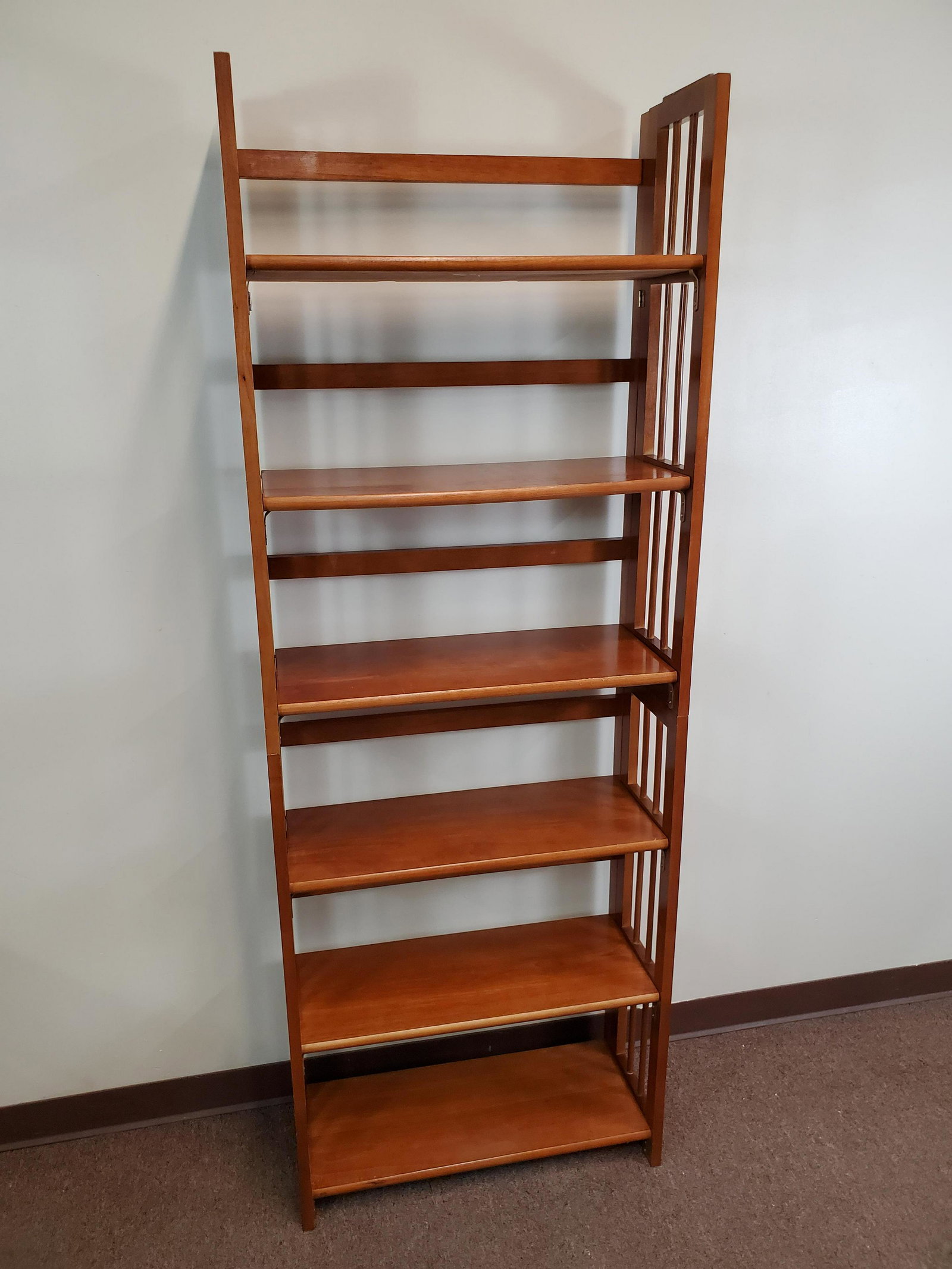 2 Stackable Bookcases: Each case is 27 1/4" wide X 11 1/2" deep X 37 3/4" high. IMPORTANT: Before bidding, please read the terms and conditions. When you registered for the auction you agreed to these terms and will be requ