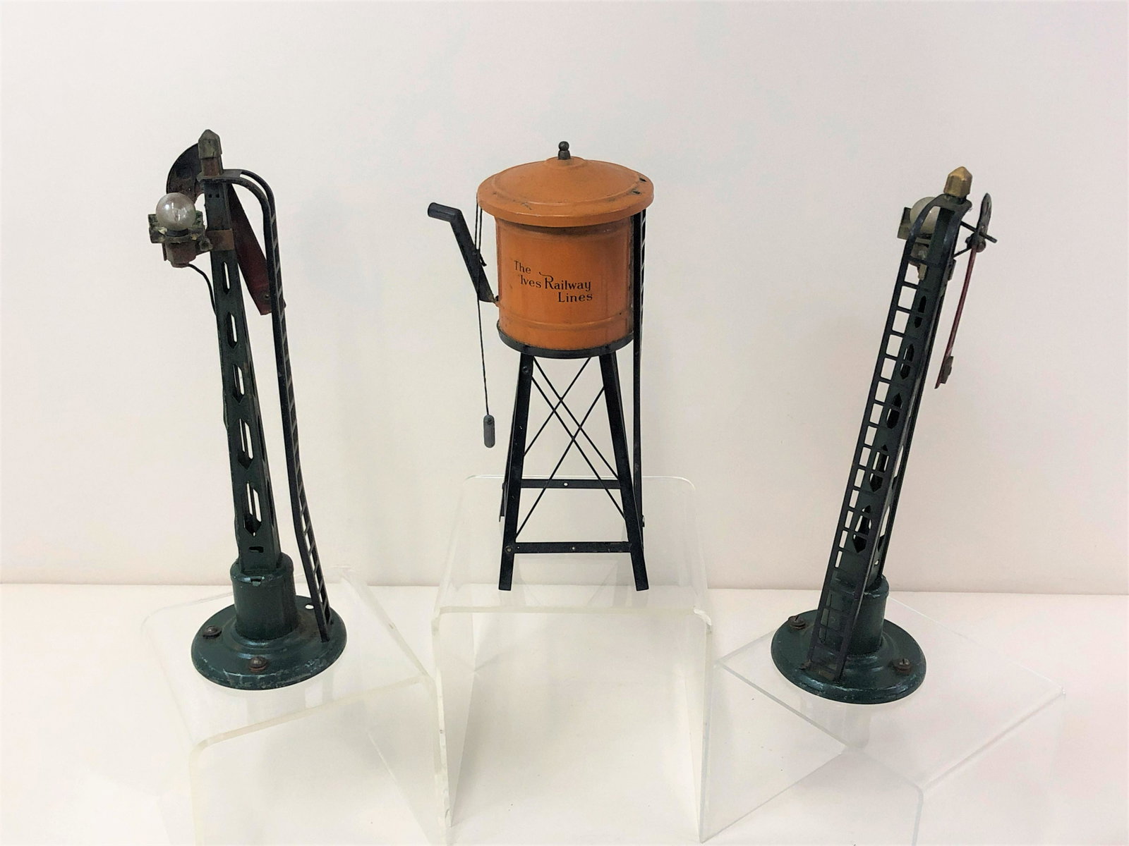 Ives Water Tower & 2 Signals: 9 3/4" to 11" high. IMPORTANT: Before bidding, please read the terms and conditions. When you registered for the auction you agreed to these terms and will be required to comply with them.