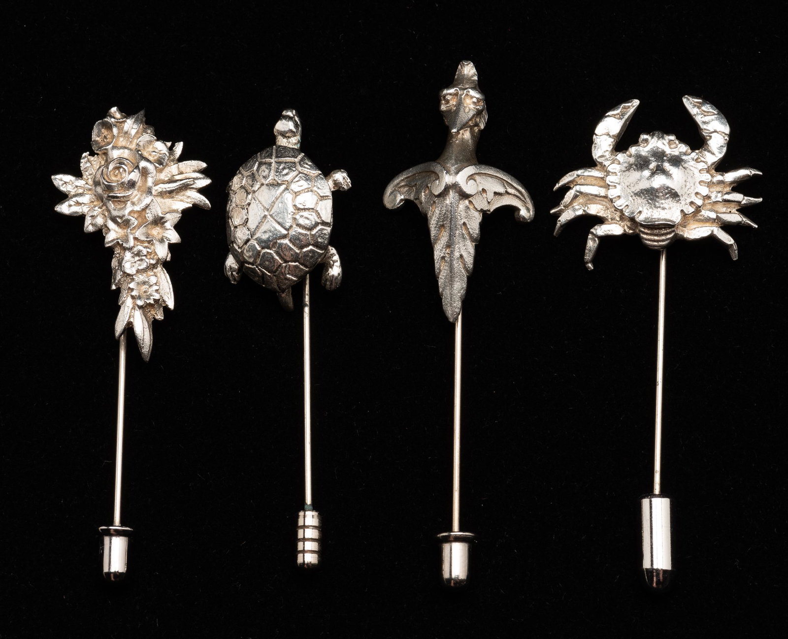 4 Sterling Gorham Figural Stick Pins: Bird 1-1/3" high. Crab 1" wide. IMPORTANT: Before bidding, please read the terms and conditions. When you registered for the auction you agreed to these terms and will be required to comply with them.