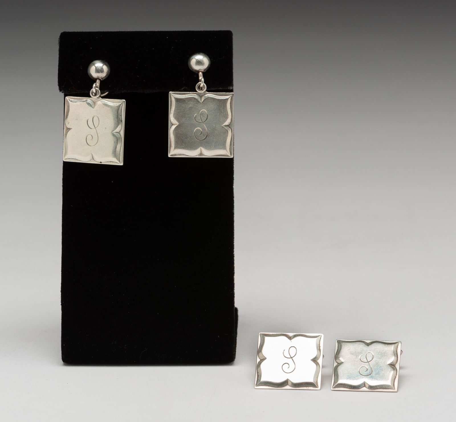 Sterling S. Kirk & Son Cuff Links and Earrings: Screwback earrings. 1" high. IMPORTANT: Before bidding, please read the terms and conditions. When you registered for the auction you agreed to these terms and will be required to comply with them.