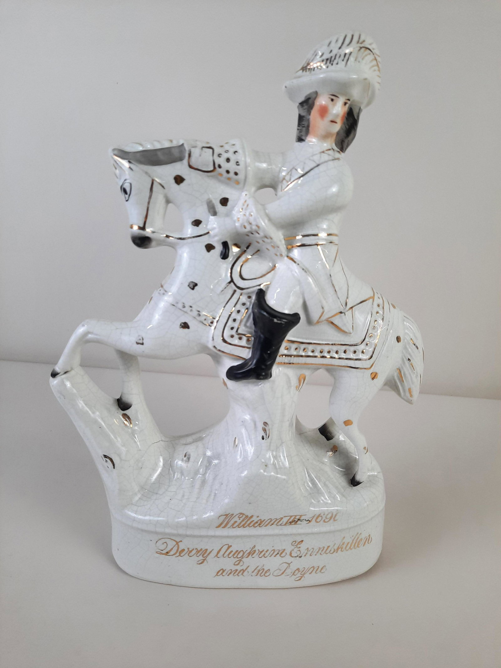 19th C Staffordshire William III Figurine: Figurine of William III on horseback 1690. 10-1/2" wide x 14-3/4" high. Minor paint loss to boot. IMPORTANT: Before bidding, please read the terms and conditions. When you registered for the auction y
