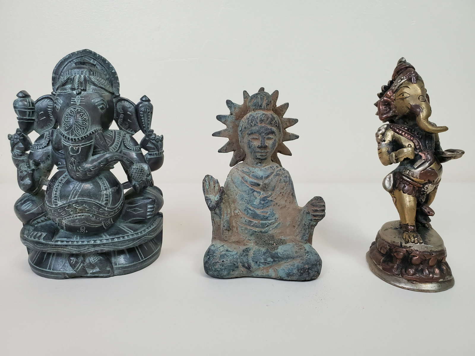 Bronze & Carved Stone Bodhisattva Figures: 4 3/4"- 5 1/2" high. IMPORTANT: Before bidding, please read the terms and conditions. When you registered for the auction you agreed to these terms and will be required to comply with them.