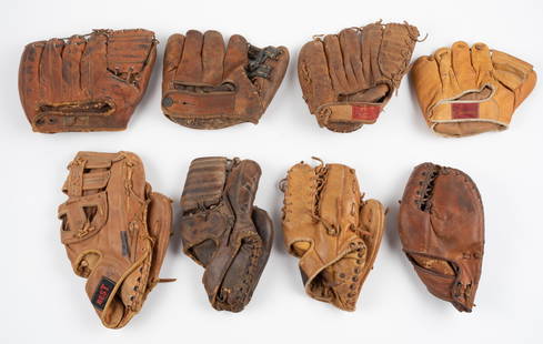 8 Vintage Baseball Gloves: Includes: 1) Circa 1930s H web fielder's glove. 2) Hollander The Chicagoan. 3) D R Made in Japan full web glove. 4) Circa 1950s barrel web Andy Skulski Professional Model. 5) Circa 1950s barrel web, b