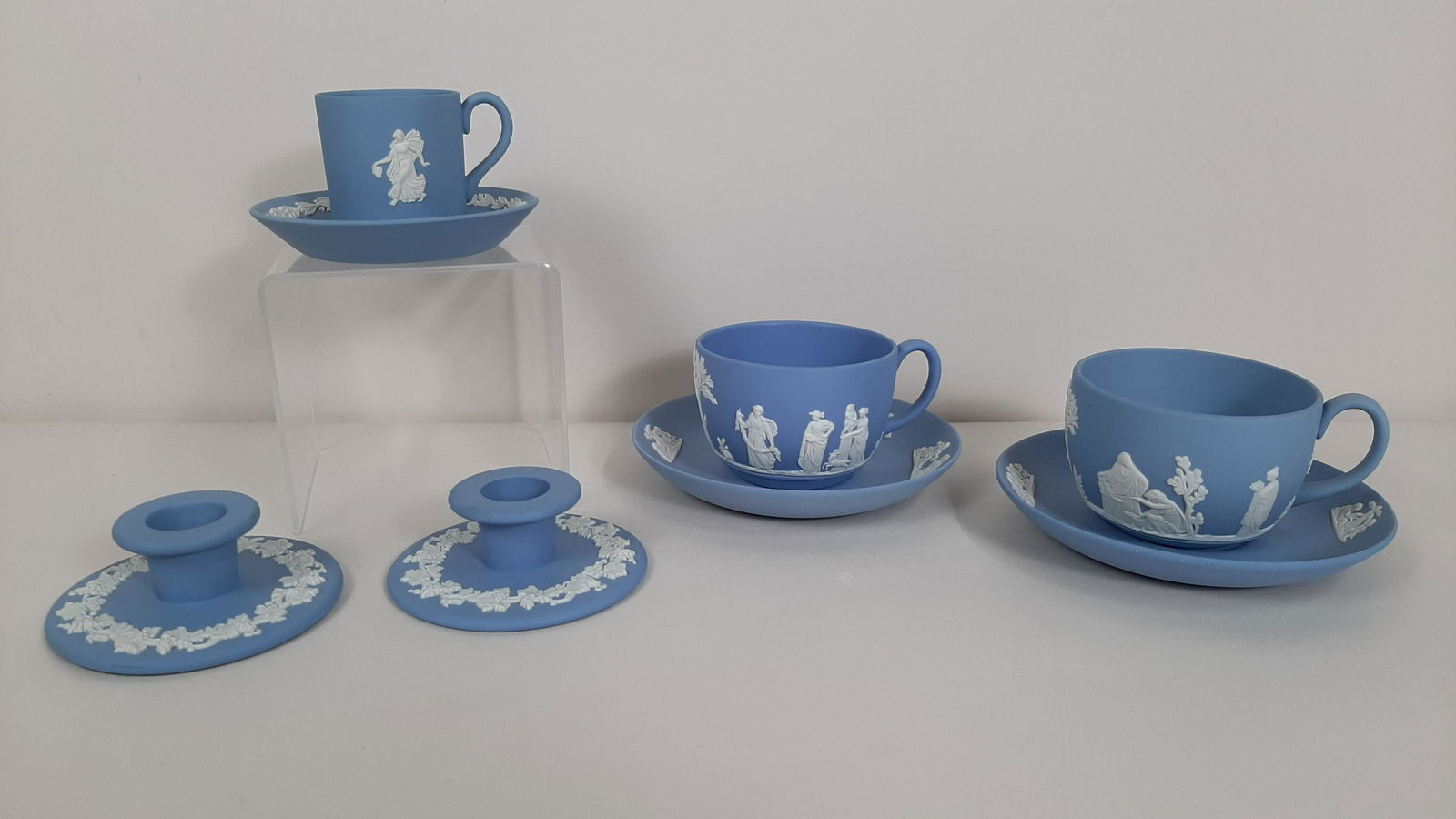 5 Pcs Wedgwood incl. Tea Cups and Candle Holders: 3½" to 5½" diameter X 1" to 2½" high. IMPORTANT: Before bidding, please read the terms and conditions. When you registered for the auction you agreed to these terms and will be required to comply w