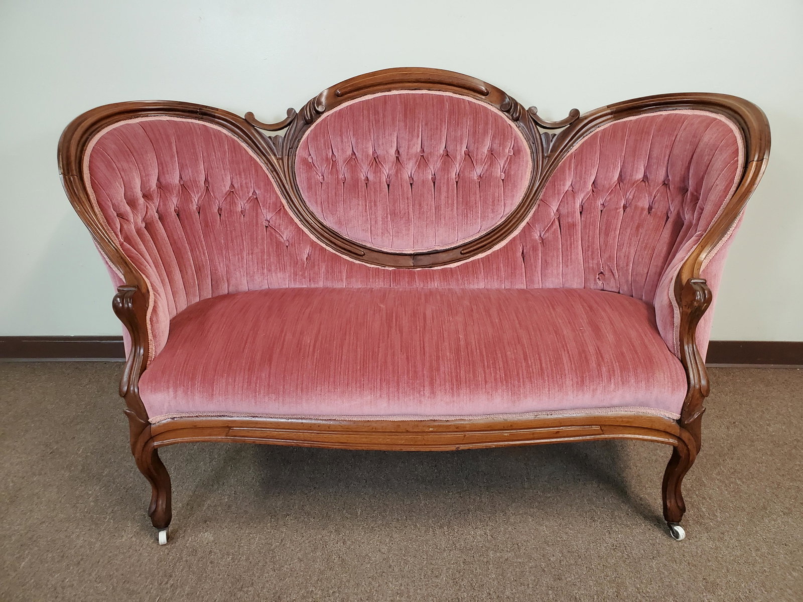 Victorian Sofa: 65" wide X 27 1/4" deep X 39" high. Has small hole on right side. IMPORTANT: Before bidding, please read the terms and conditions. When you registered for the auction you agreed to these terms and wil