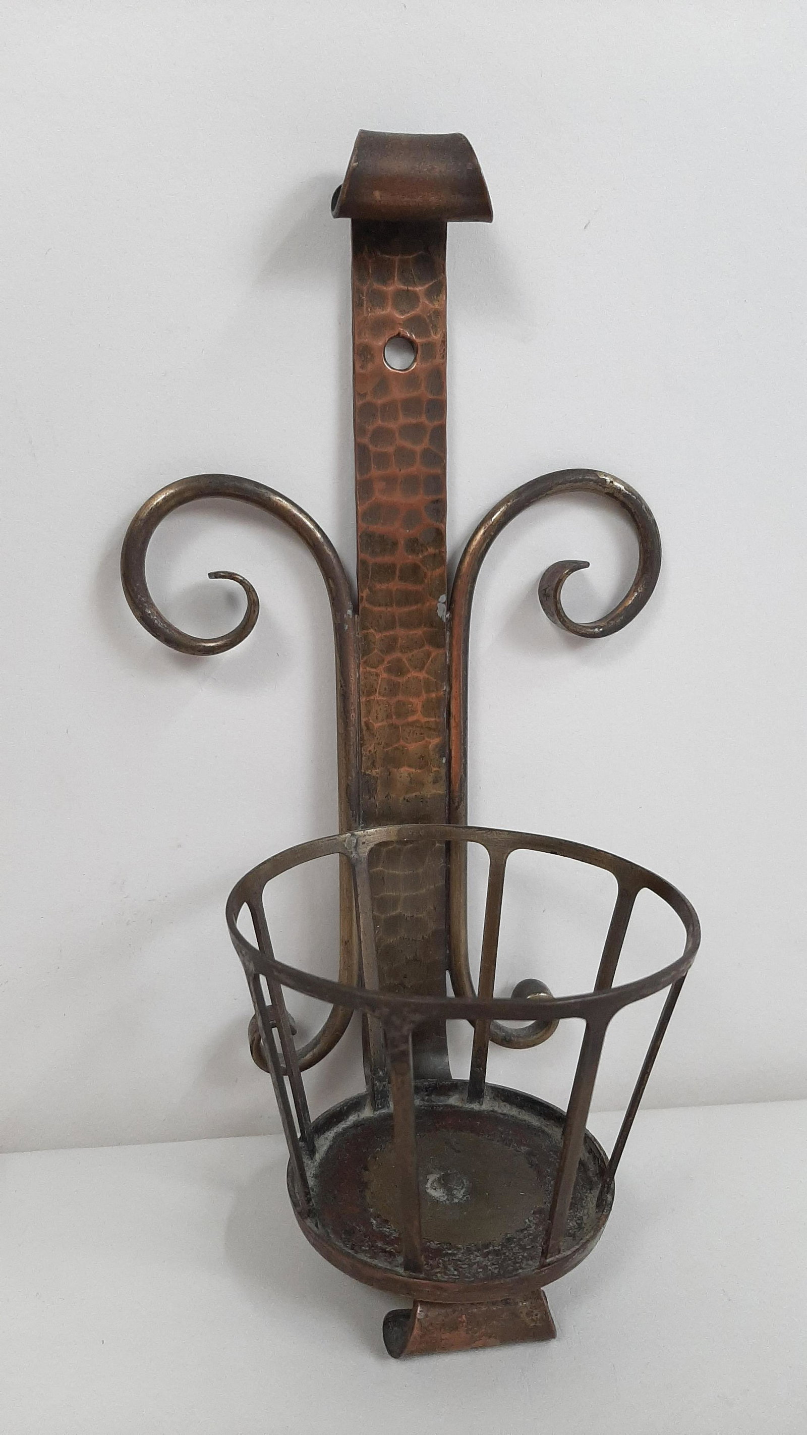 Antique Roycroft Candle Sconce: 4½" wide X 3½" deep X 8½" high. IMPORTANT: Before bidding, please read the terms and conditions. When you registered for the auction you agreed to these terms and will be required