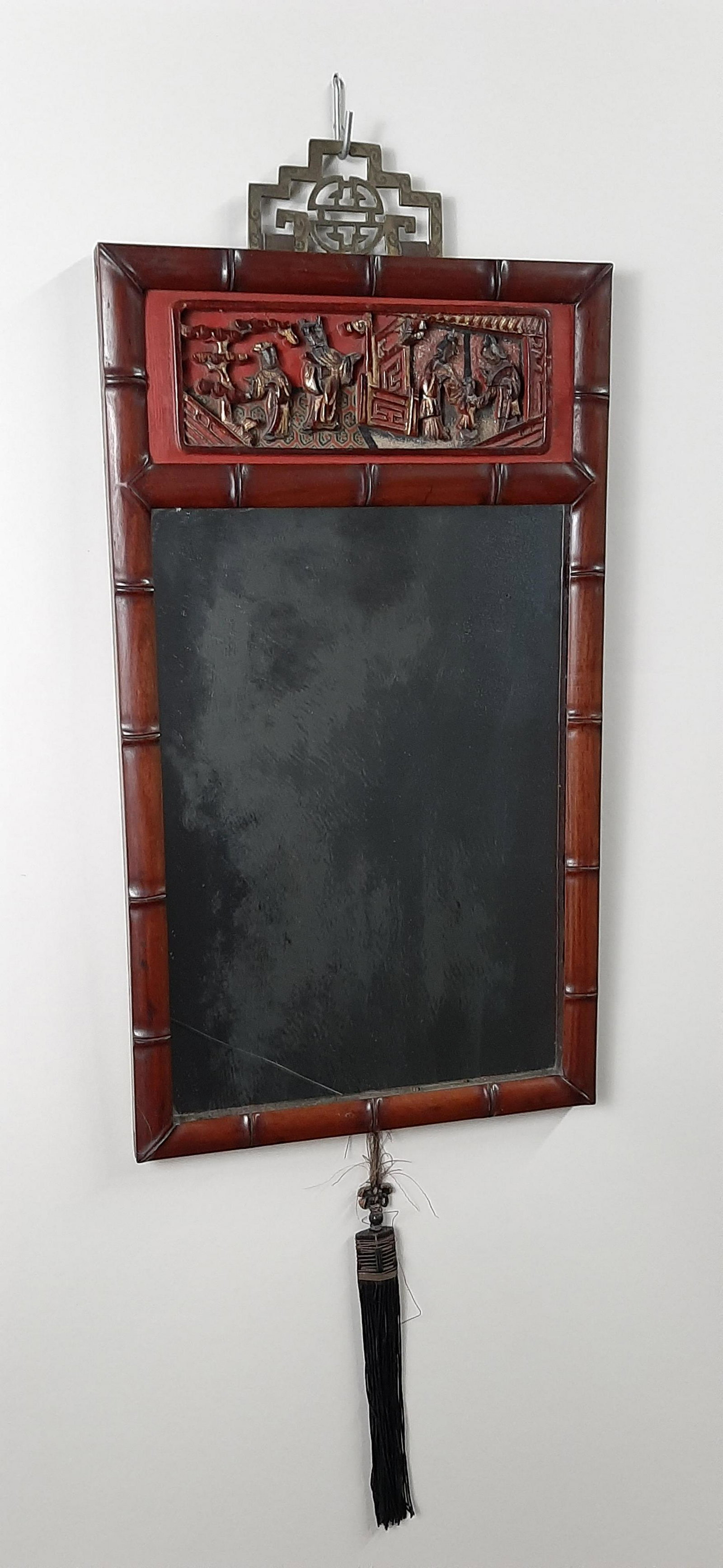 Antique Chinese Carved Mirror: Overall with frame 11½" wide X 22¼" high. IMPORTANT: Before bidding, please read the terms and conditions. When you registered for the auction you agreed to these terms and will be required to compl