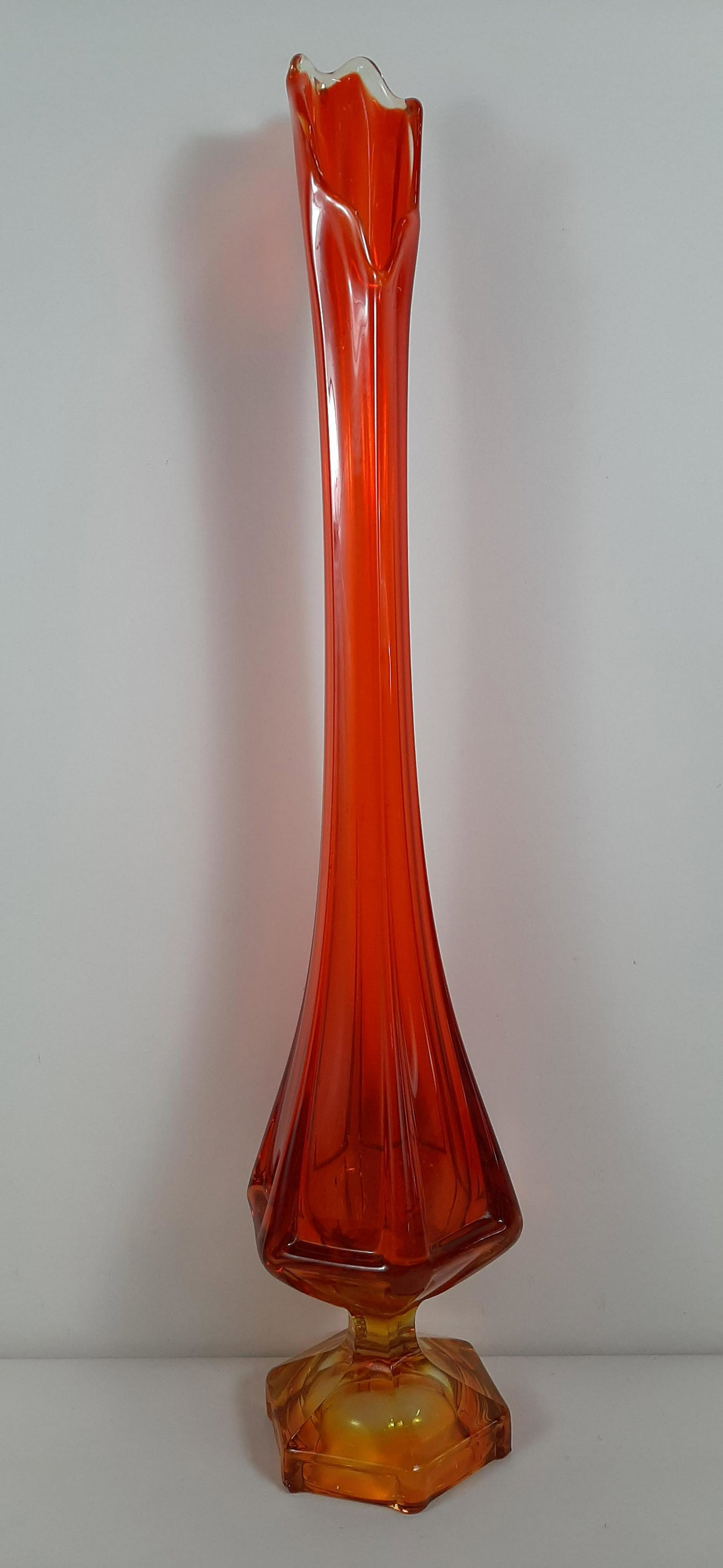 Persimmon 25" Viking Epic Column Glass Vase: 5" diameter X 25" high. IMPORTANT: Before bidding, please read the terms and conditions. When you registered for the auction you agreed to these terms and will be required to comply with them.